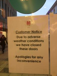 Corporate sign at the Mall from last winter in which they announced they were deploying a door-closing exercise.